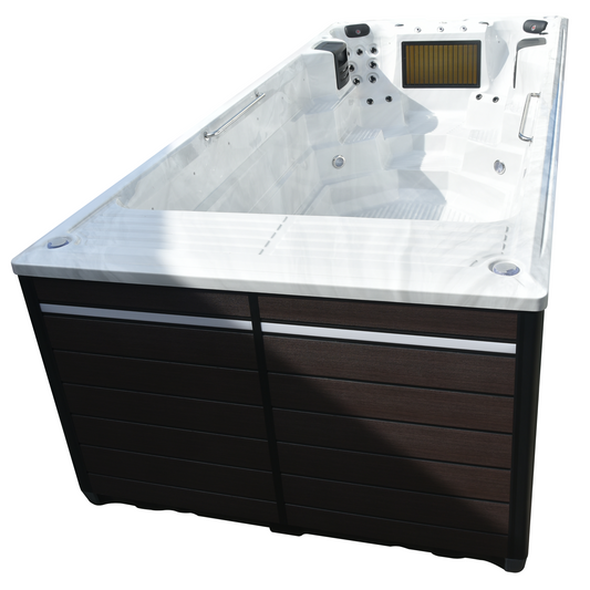 
Canadian Spa 19ft St. Lawrence swim spa — angled view showing dark wood-effect cabinet and open acrylic shell — KS-10034