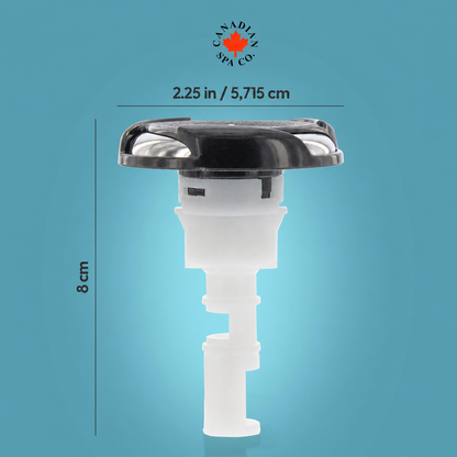 A drain plug for a spa or bathtub, featuring a black top cap and a translucent white plastic body, shown with dimension markings of 2.25 in (5,715 cm) in diameter and 8 cm in height, on a blue gradient background with the Canadian Spa Co logo.